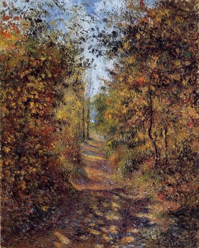 Un camino en el bosque pontoise 1879 Camille Pissarro Pinturas al óleo